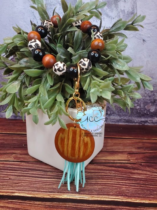 BYO wristlet, build your own keychain bracelet, wood disc with tassel, silicone or wood bead keychain bracelets, laser blanks, laser engraving blank