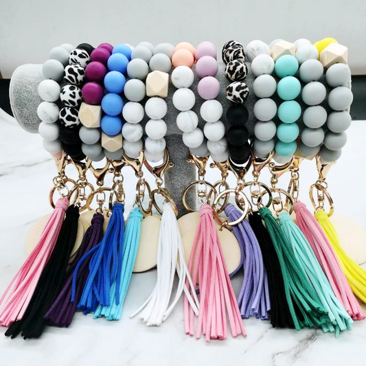 Silicone bead keychain bracelets with 2" light wood disc and tassel, engraving blanks